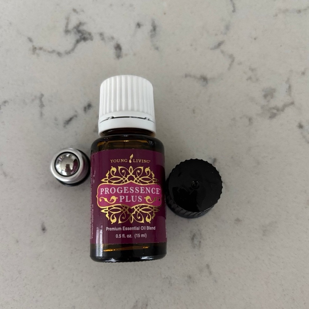 Young Living Progessence Plus Oil w / roller top
